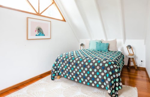 Cape Schanck House | Rosemary Cottage - you'll be greeted by a sprawling lawn and a canopy of mature trees.