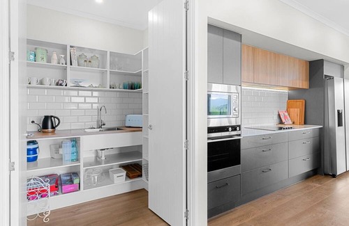 Mangawhai House | Tara Olive Sanctuary - Large, stylish, sunny holiday home in a beautiful rural setting