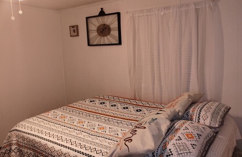 Naples House | Escape to tranquility and seclusion at Two River Cottage.