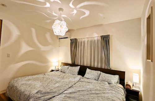Ichinomiya House | Enjoy illuminations palm trees the majestic sea / Choseigun Chiba