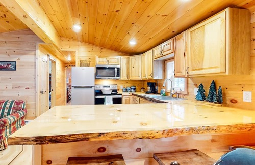 Long Lake House | Tree-lined lakefront cottage close to marina with partial AC - dog-friendly