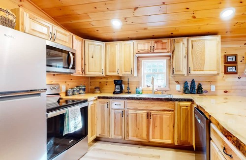 Long Lake House | Tree-lined lakefront cottage close to marina with partial AC - dog-friendly