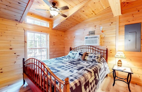 Long Lake House | Tree-lined lakefront cottage close to marina with partial AC - dog-friendly