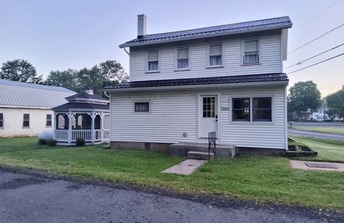 Laurelton House | White house walking distance to Penn's Creek and Bald Eagle State Forest.