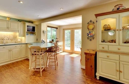 Cordova Mines Cottage | Large, private and dog friendly Country Home on a River with a Hot Tub & Sauna!