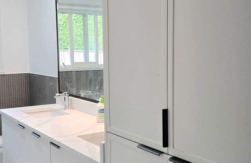 Steveston House | Guest Suite Studio One bedroom Large bathroom living room fenced yard Privacy