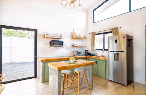 Sardinal House | Spacious modern home with firepit, lush yard, dog friendly & near beach