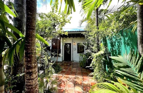 Coral Way Cottage | Charming 1-bedroom cottage in lovely Miami with AC, TROPICAL FOOD FOREST GARDEN