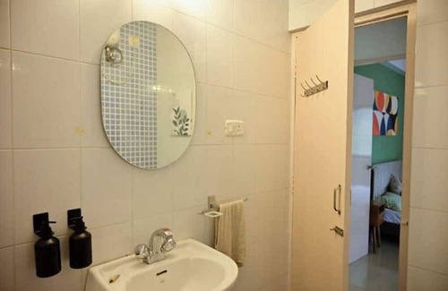 Benaulim Bed & Breakfast | Styled midcentury apartment with huge terrace. 5 minute walk to the beach!