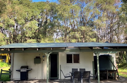 Peaceful Bay Ski Chalet | Chalet 8 Beautiful little chalet, close to the beach & surrounded by peppi trees