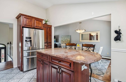 West Islip House | Relax in Style: Heated Pool, Golf Area, Gym & 2 Offices at Luxury Home