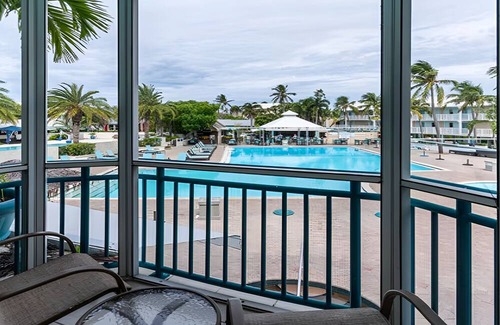 Captiva Hotel | Spacious Poolside Unit w/Balcony | Free Parking | Outdoor Swimming Pool