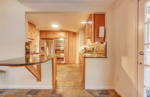 Terrell Heights House | Enchanting 4-bedroom house with Pool, Theater, Firepit and Games. Pet Friendly.