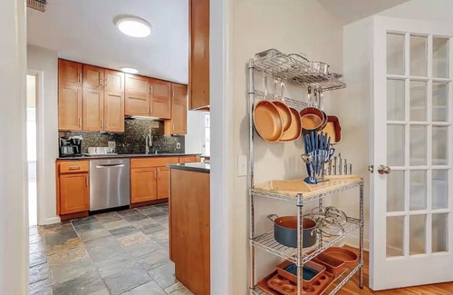 Terrell Heights House | Enchanting 4-bedroom house with Pool, Theater, Firepit and Games. Pet Friendly.
