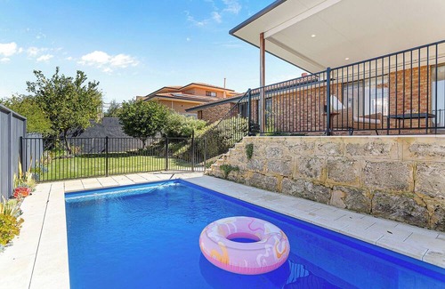 Marmion House | Welcome to your perfect family getaway in Marmion! This spacious home combines comfort, fun, and convenience — with endless entertainment for kids, modern amenities for adults, and the coast just minutes away.
