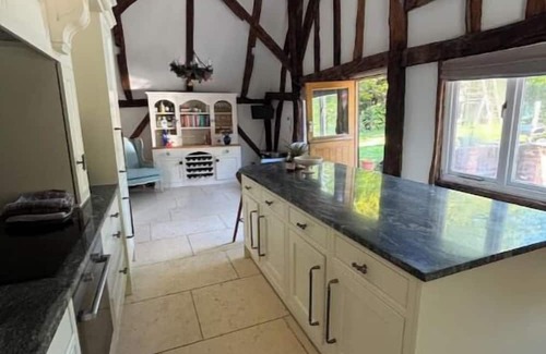 Sheldwich House | Kent barn private pool, hot tub & kids play area