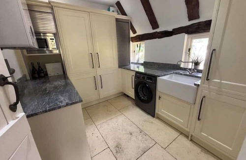 Sheldwich House | Kent barn private pool, hot tub & kids play area