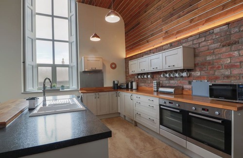 Norham Cottage | THE OLD CHAPEL, pet friendly, with open fire in Norham