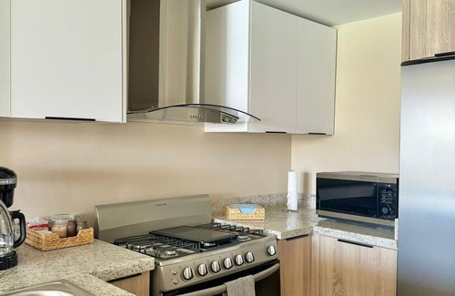 Punta Cana Condo | Chic Boho Apartment Overlooking Crystal Lagoon