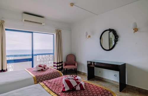 Oura Hotel | Beachfront Hotel with Indoor & Outdoor Pool! 2 Homely Units with Full Kitchens!