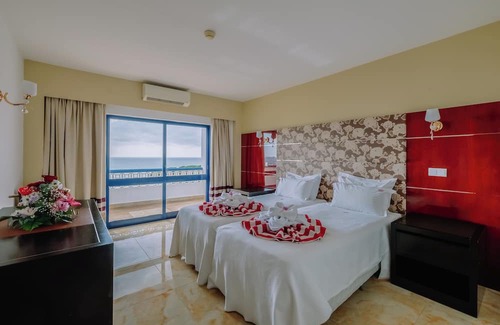 Oura Hotel | Beachfront Hotel with Indoor & Outdoor Pool! 2 Homely Units with Full Kitchens!