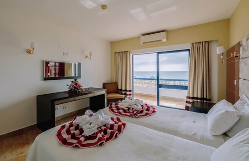 Oura Hotel | Beachfront Hotel with Indoor & Outdoor Pool! 2 Homely Units with Full Kitchens!