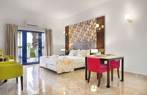 Oura Hotel | Group Getaway in Oura Beach! Four Sea View Units, Swimming Pools, Beachfront!