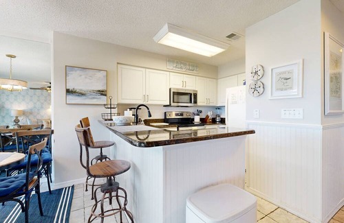 American Beach House | Newly Decorated, Oceanfront Townhouse with Patio, WiFi, W/D & Shared Pool