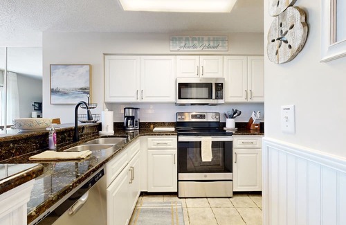 American Beach House | Newly Decorated, Oceanfront Townhouse with Patio, WiFi, W/D & Shared Pool
