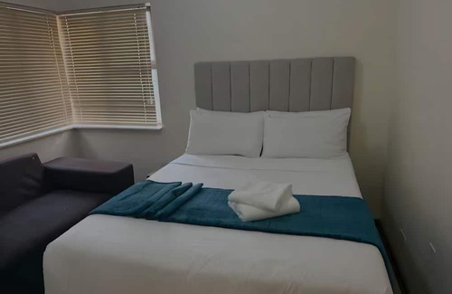 Maseru House | Suburban City View Home