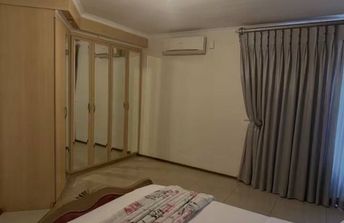 Maseru House | Suburban City View Home