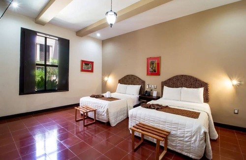 Centro Hotel | Twofold Escape: 2 Stays, 4 Beds, Steps from City Attractions