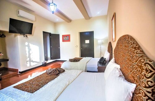 Centro Hotel | Twofold Escape: 2 Stays, 4 Beds, Steps from City Attractions