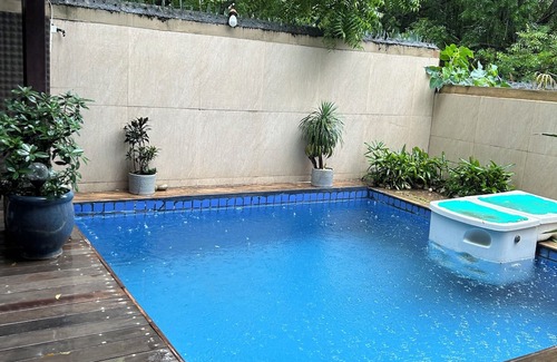 Gurugram Villa | Charming Villa with Soaking Pool & Serene Outdoor Spaces.