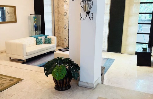Gurugram Villa | Charming Villa with Soaking Pool & Serene Outdoor Spaces.