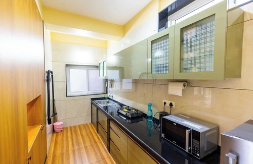 Tonse West Apartment | Riverside Retreat HomeStay – AC Studio with Breakfast Option & Boat Ride