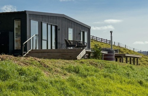 Tawharanui Cabin | Omakana Cottage, Omakana Cottage with Farm Views & Cedar Hot Tub