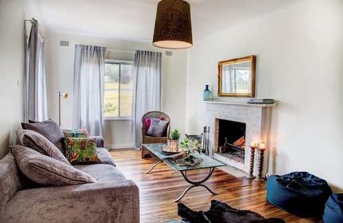 Berrima Cottage | Berrima Cottage offers ambience, open fire, AC walk to village, Pets welcome.