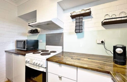Batehaven Apartment | Manhattan - Stylish 1BR Beachfront on Casey’s