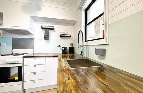 Batehaven Apartment | Manhattan - Stylish 1BR Beachfront on Casey’s