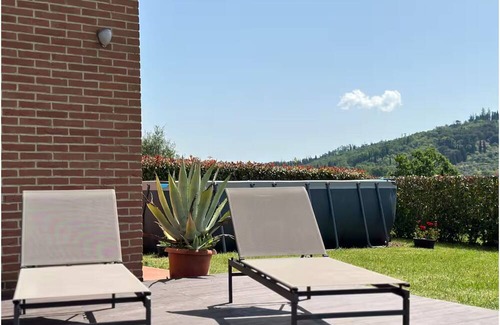 Pieve al Bagnoro House | An oasis of peace and warmth of home, amidst thoughtful design and views toward the hills.