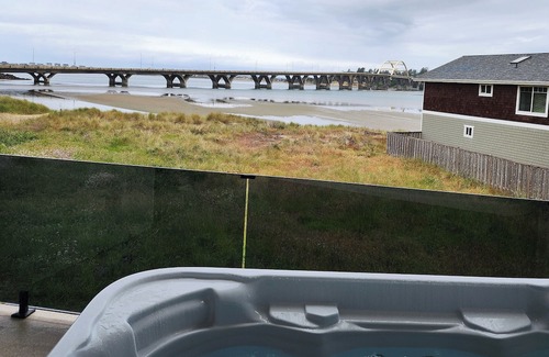 Waldport House | Spectacular Bridge and Bay Views! Bayfront, Hot Tub, Dog Friendly, Fireplace!