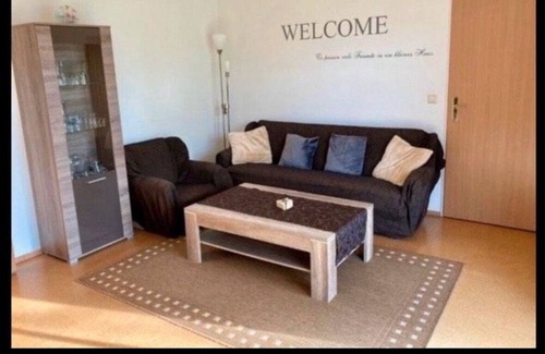 Detern House | Spacious ground floor apartment in a quiet residential area with a beautiful garden.