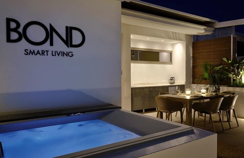 Khalandrion Apartment | Dazzling Athens Maisonette | Ialysos Maisonette | 2 Bedrooms | Private Furnished Balcony with Outdoor Dining Area and Sunbeds | Private Outdoor Jacuzzi | Exercise Equipment | Prime Location | Chalandri