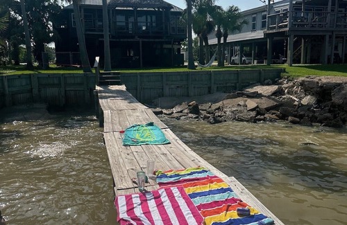 Dickinson House | Charming 2-bedroom house with hot tub and dock right on the San Leon bay