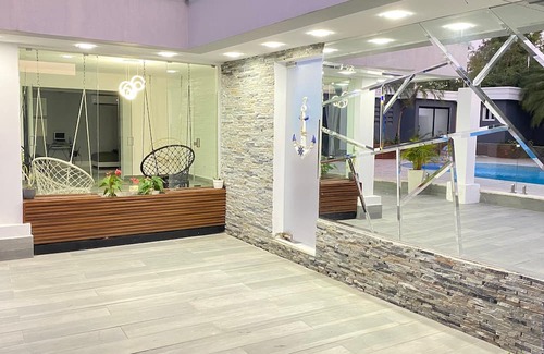 Santiago de los Caballeros Villa | Glass Room in the Mansion, Pool, Chef