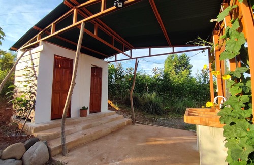 Las Lomas Bed & Breakfast | Kocorica Private room with terrace and bathroom in the countryside.