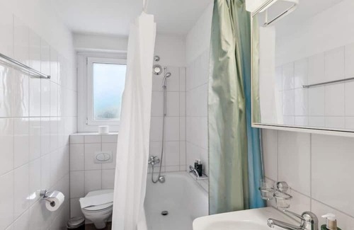 Center Apartment | Basic 3BR Stay with Balcony Near Zürich HB