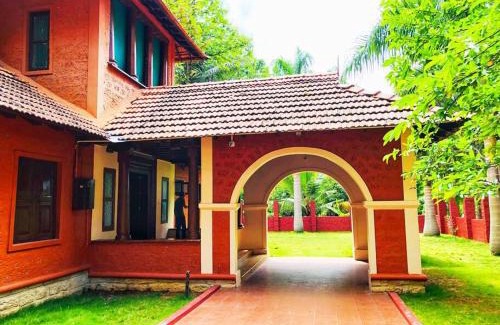 Ramanagara Villa | Ambara Kovilakam Private Pool Villa by Travent Mug