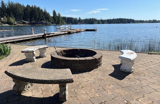 Lakefront property, beautiful view with steps into water, large private dock.